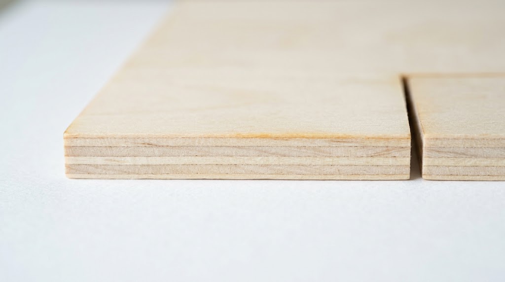 3mm basswood sheets cut by Sculpfun laser — clean kerf edges close-up