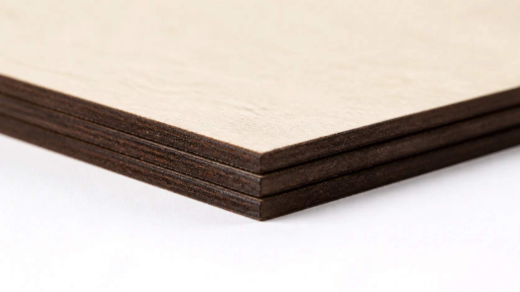Close-up of 3mm basswood cut by Monport 40W — clean kerf with minimal charring