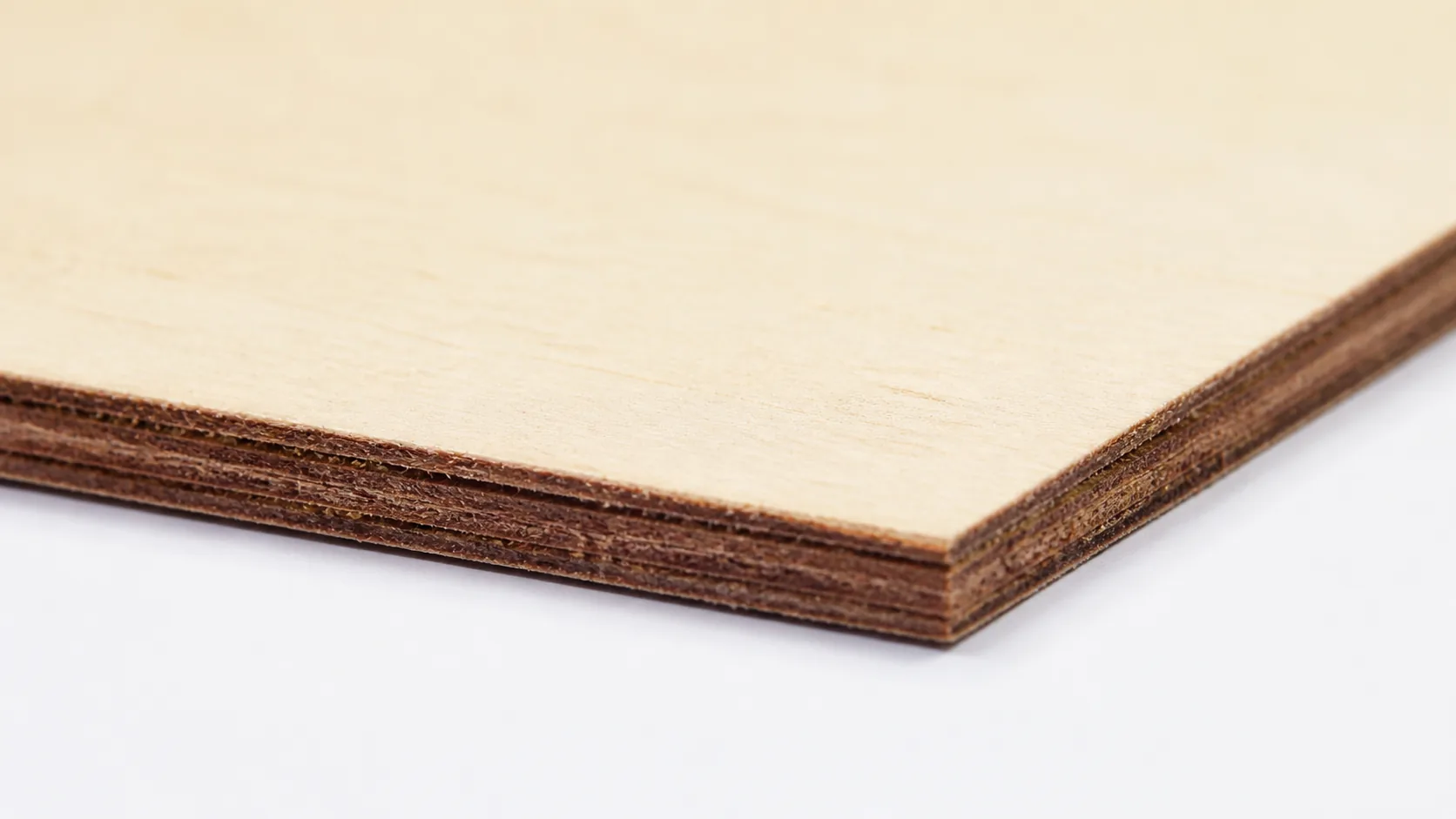 Close-up of 3mm basswood freshly laser cut by Elegoo Phecda 20W — clean kerf with minimal charring